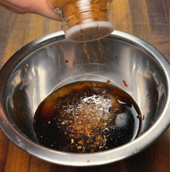 Adding five spice to char siu marinade made from scratch to give char siu chicken flavor and is going to be marinated for approximately 15 minutes to impart more char siu flavor just like char siu pork.