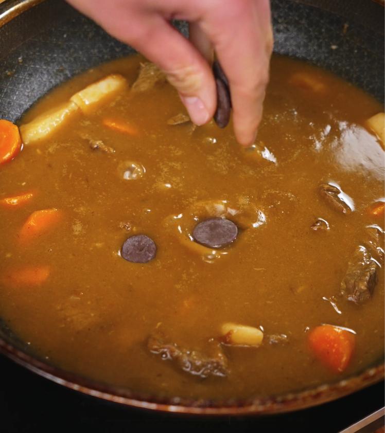 A few pieces of dark chocolate are added to the curry, enhancing the richness and complexity of the sauce in this Japanese beef curry.