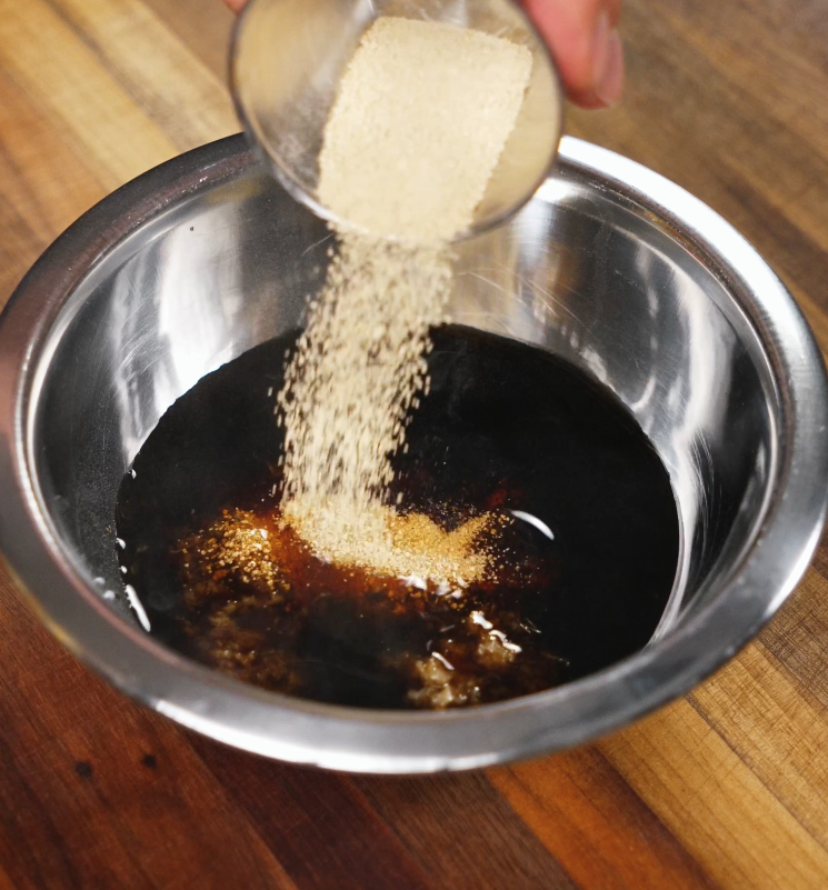 Adding brown sugar to soy sauce glaze mixture for a sticky pork rice bowl butadon glaze