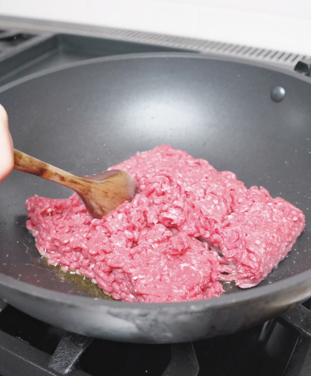 Ground beef cooking in a skillet for Sticky Sweet Ground Beef Recipe.