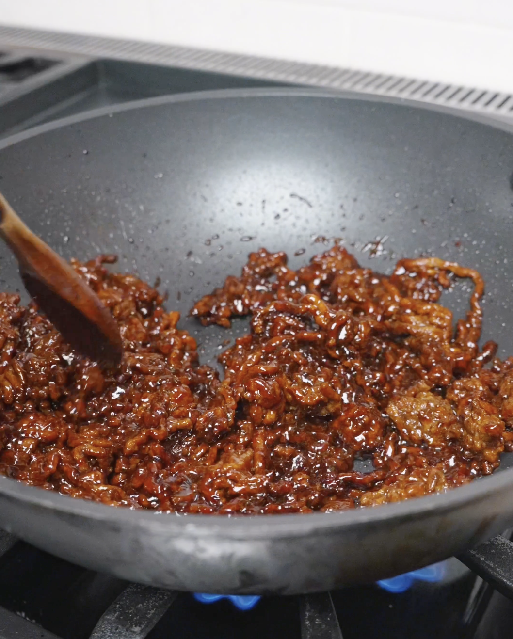 Sticky Sweet Ground Beef Recipe simmering as the sauce reduces into a thick glossy glaze.