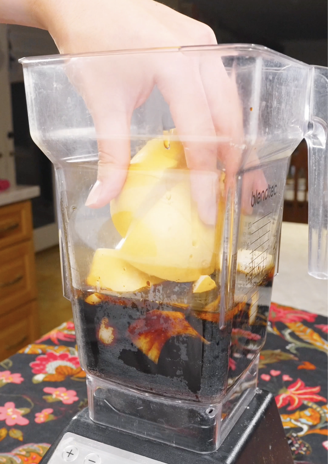 Korean apple pear being added to soy sauce, onion, and garlic in a blender for Korean BBQ Short Rib Recipe.